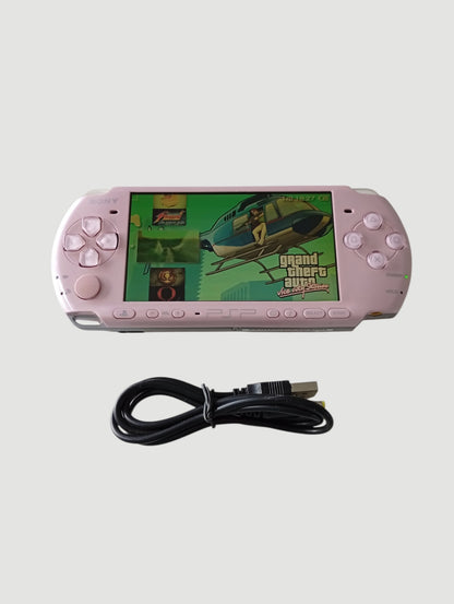 Consola psp 3000 rosada liberada en micro sd 32 gb